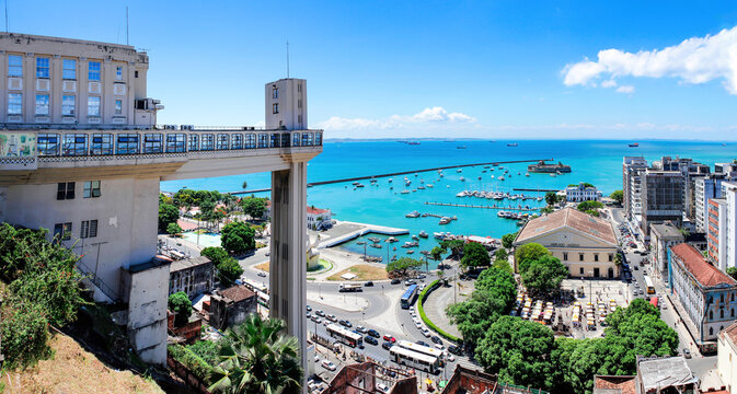 Elevador Lacerda in Salvador, Bahia, Brazil city skyline view with model market, Todos os Santos Bay, Forte San Marcelo. blue sea in sunny day
