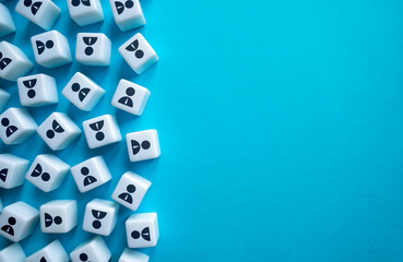 Lots of workers symbols on blocks on a blue background. Employees, candidates for vacancies. HR...