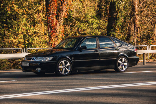 Ukraine, Chernihiv - October 10, 2022: Old Swedish car Saab 9-3 Aero on the road. Car in motion