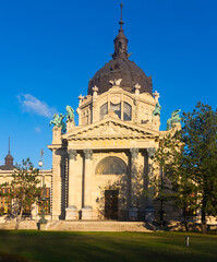 Cityscape of Budapest with building of Szechenyi thermal bath in sunny autumn day.