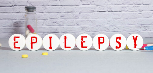 EPILEPSY inscription on wooden cubes isolated on white background, medicine concept.