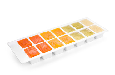 Different purees in ice cube tray isolated on white. Ready for freezing