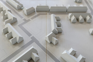 Top view of white architectural models. Architect's design thinking process. Urban planning model....