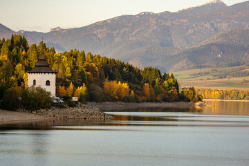 autumn landscape with lake and church,  Liptovská Mara, Liptov, Slovakia