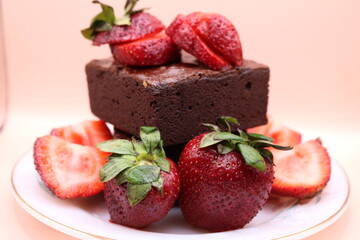 close up chocolate cake with strawberries sensitive focus