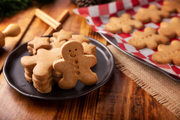 Homemade gingerbread man cookies, traditionally made at Christmas and the holidays.