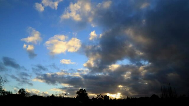 Golden Sunset with Sun Rays Time Lapse Dark Cloid