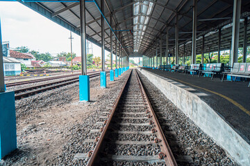 Fototapeta na wymiar Jombang station which is still very empty of passengers due to the effects of the covid 19 pandemic, the station looks a little bit crowded at peak hour