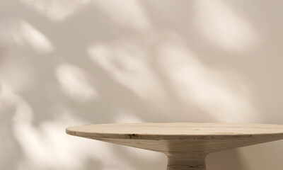Wooden round side table with beautiful sun light and dappled leaf shadow on beige wall for luxury...