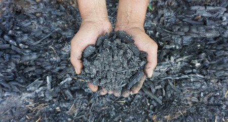 Farmers catch charcoal that is used as a fertilizer to nourish trees planted in their plantations and as a fuel for warmth.