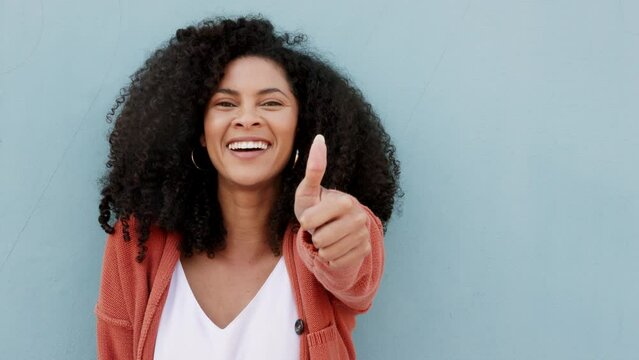 Black woman portrait, thumbs up success and winner support, trust and happy feedback on colorful background. Smile, agreement and yes sign vote of african person with thank you, praise and like emoji