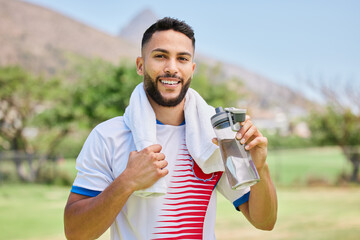 Portrait, fitness and soccer player drinking water in training, cardio exercise and football field...
