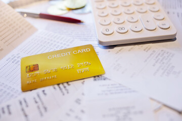 Close up view, cradit card with calculator and many receipt, bank statement and pass book, Credit...