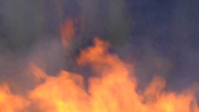 Fire burns continuously, as the spark from the fire shows. For flame and heat background or any dynamic power background.