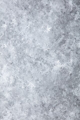 White snowflakes in winter as a background.