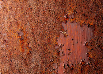 Old rusty metal sheet as an abstract background.