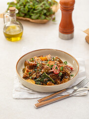 Portion of gourmet crispy eggplant salad with sesame seeds