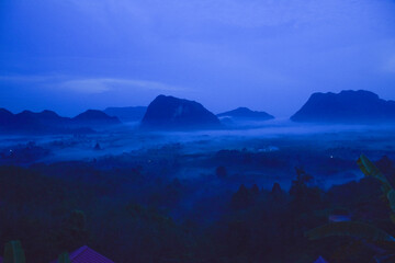 Early morning mist and beautiful mountain in south Thailand