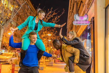 Doing a piggyback ride together and having a fun time together