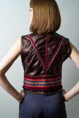 Beautiful woman posing in fashion jacket