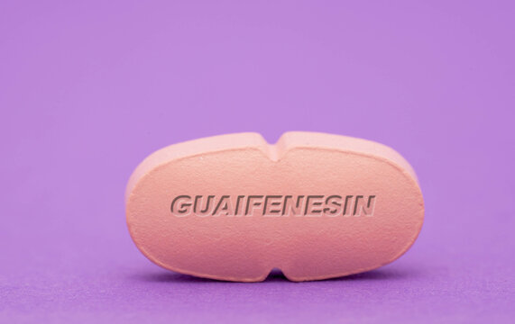 Guaifenesin Pharmaceutical medicine pills  tablet  Copy space. Medical concepts.