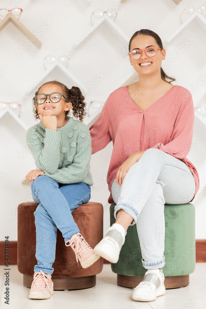 Sticker Glasses, portrait and mother with her child at an eye clinic retail store for healthy vision and eyes wellness. Happy customer, mom and young girl enjoys shopping for quality eye care with insurance