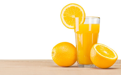 Fresh orange juice on wooden table over grunge background
