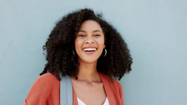 Education, fashion and a woman on her way to university with a smile and a gray background. Learning, bright future and a happy college student. Studying, scholarship and female empowerment in Africa