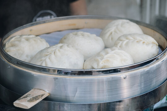 Korean pyanse steamed pies in a steamer.