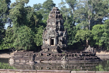 Neak Pean (or Neak Poan) at Angkor, Cambodia is an artificial island with a Buddhist temple on a circular island in Jayatataka Baray.
