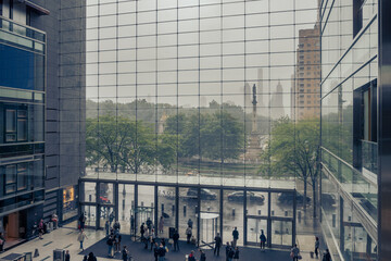 Looking out the window of shopping mall to Columbus Circle and Central Parl in New York City during...
