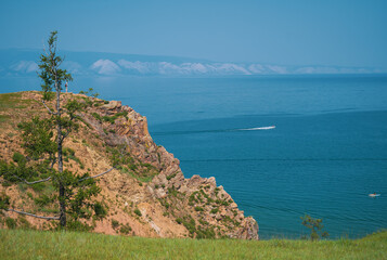 Cliffs on Olkhon Island. Lake Baikal is a rift lake located in southern Siberia, Russia. The...