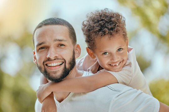 Dad, family and piggy back portrait with happy son in park to relax, bond and smile together. Father, happiness and wellness of parent with young child enjoying outdoor summer fun in nature.