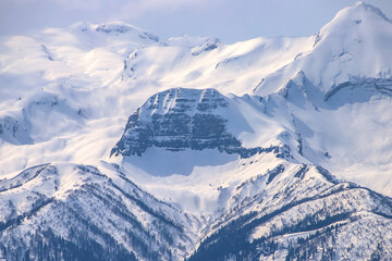 Snowy mountains in sunny weather