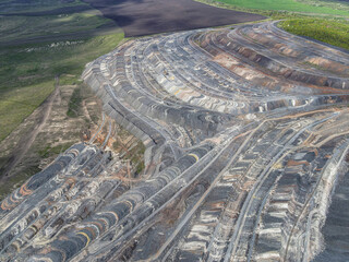 Aerial view on large iron ore mining quarry