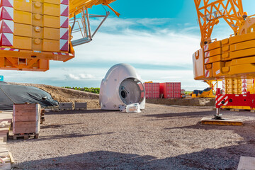 Building and assembling a construction windturbine by crane. Rotor, Component of a wind turbine....