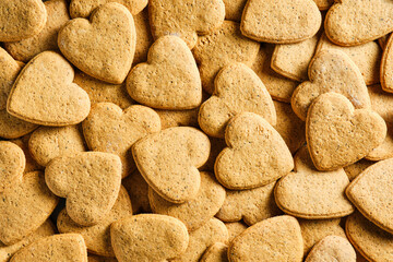 pile of heart shaped gingerbread cookies seen from above