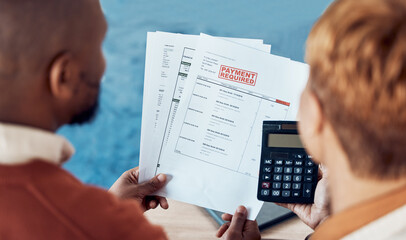 Financial bills, documents and couple with calculator for home accounting of mortgage loan,...