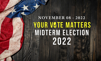 American Midterm election banner with United States of America flag on wooden table