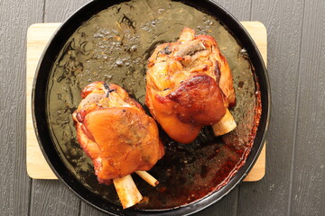 two juicy pork knuckles from the grill