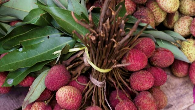 fresh organic bunch of litchi from farm close up from different angle