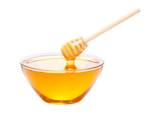 fresh natural honey in transparent cup with honey dipper isolated on white.