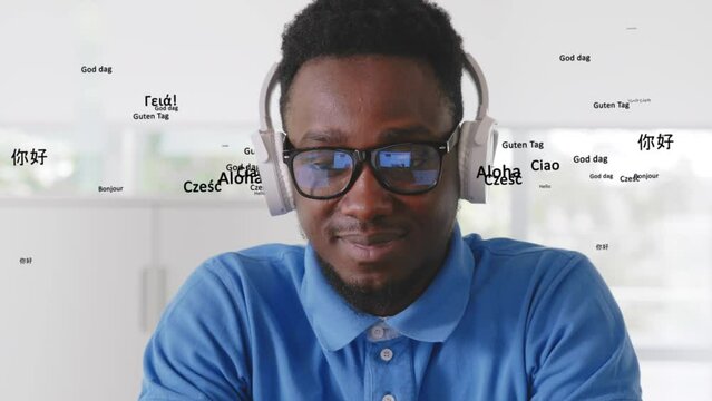 African-American man in headphones listen to music with different languages hello words hologram