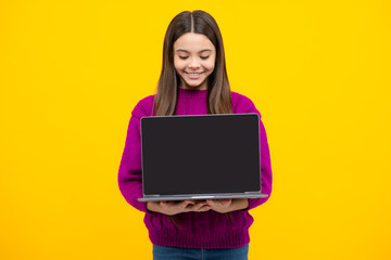 Young student school girl, studying with laptop computer. Screen of laptop computer with copyspace mockup. E-learning concept.