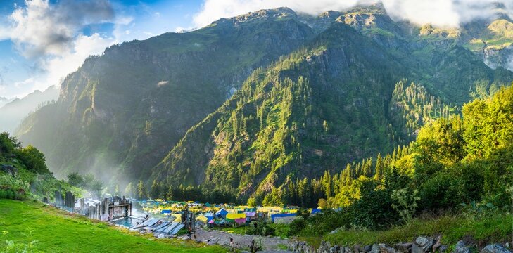 Landscape with mountains and clouds in Kheerganga, Himachal Pradesh, India.
