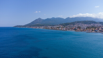 Obraz premium Aerial view of turquoise blue Mediterranean water on the coast of Samos, Greek Aegean Sea
