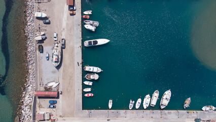 Small yacht port seen from aerial drone view in the Aegean island of Samos