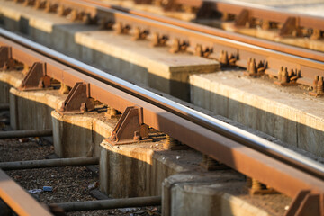 Detail view of rusty tram tracks. Tram public transportation industry.