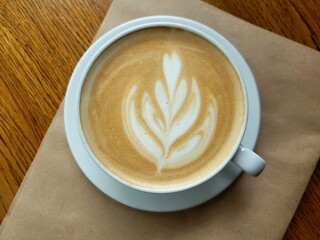 A cup of coffee on a table in a cafe