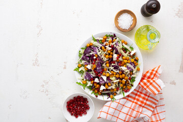 Top view of coleslaw vegan salad with roasted chickpea beans